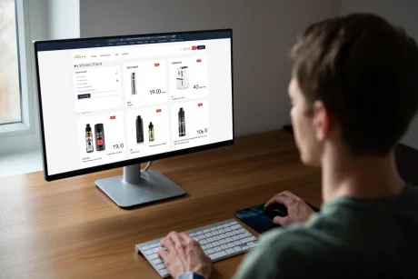 A person securely shopping at the best online disposable vape store in Australia on a laptop.